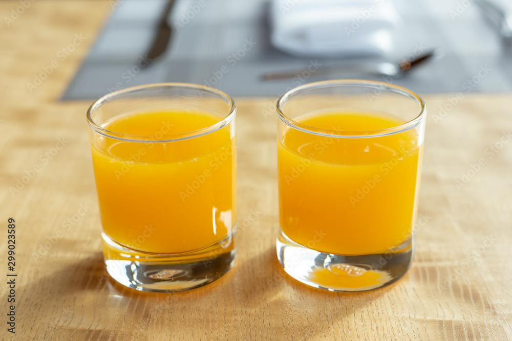 Fresh orange juice on table Fresh orange juice on table