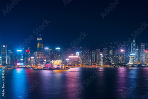 Cityscape and skyline at Victoria Harbour in Hong Kong city at Night