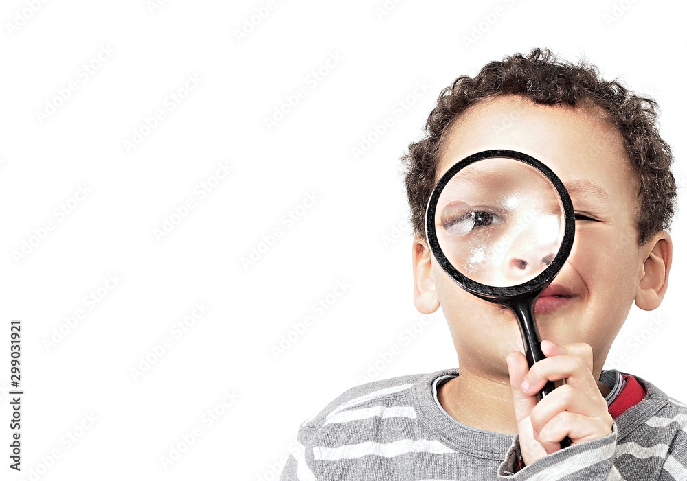 boy with magnifying glass ready to explore stock photo boy with magnifying glass ready to explore stock photo