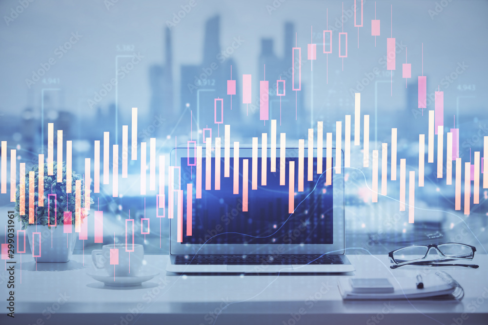 Forex graph hologram on table with computer background. Multi exposure. Concept of financial markets. Forex graph hologram on table with computer background. Multi exposure. Concept of financial markets.