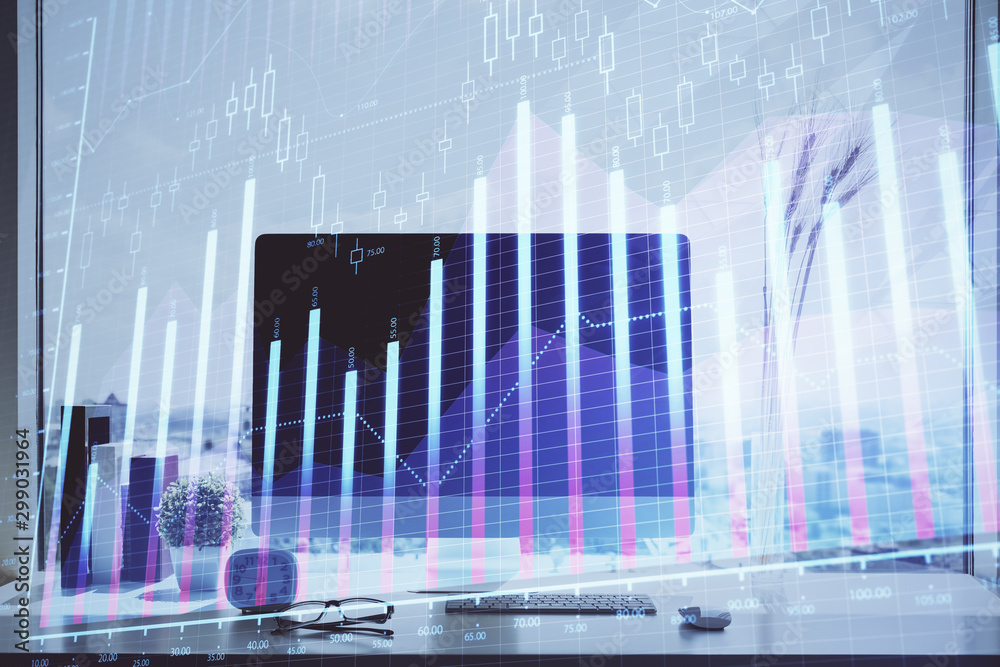 Stock market chart hologram drawn on personal computer background. Multi exposure. Concept of investment. Stock market chart hologram drawn on personal computer background. Multi exposure. Concept of investment.