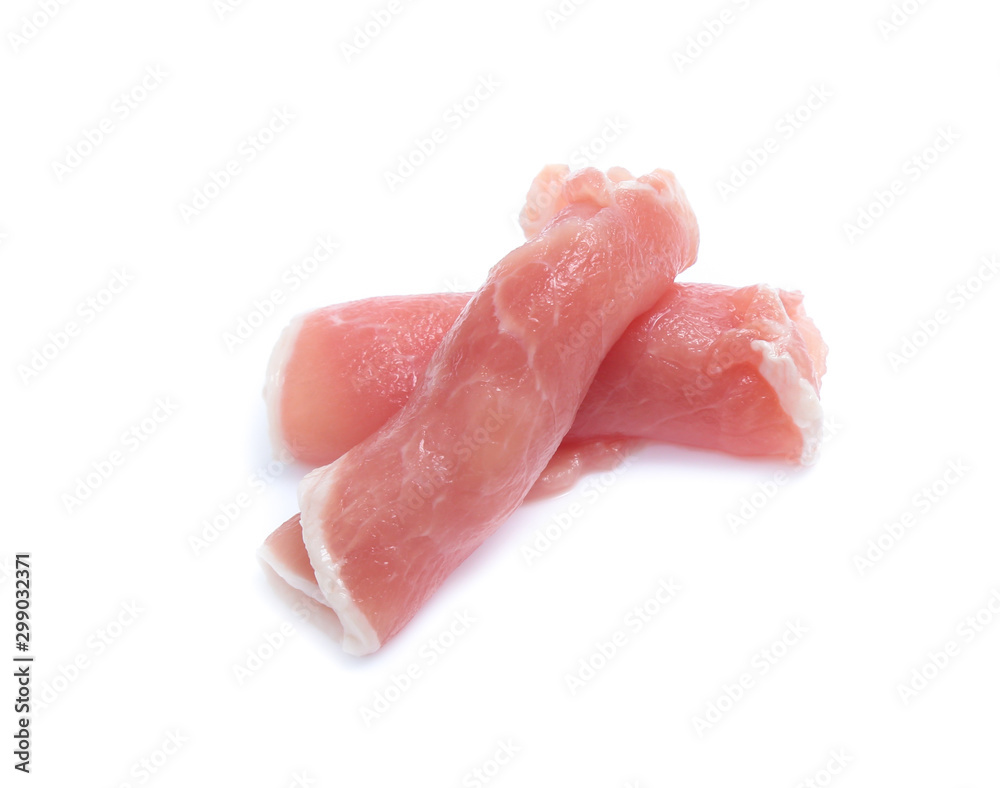 Raw pork meat with parsley herb leaves isolated on white background Raw pork meat with parsley herb leaves isolated on white background