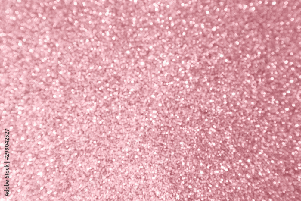 Abstract blur rose gold glitter sparkle defocused bokeh light background Abstract blur rose gold glitter sparkle defocused bokeh light background