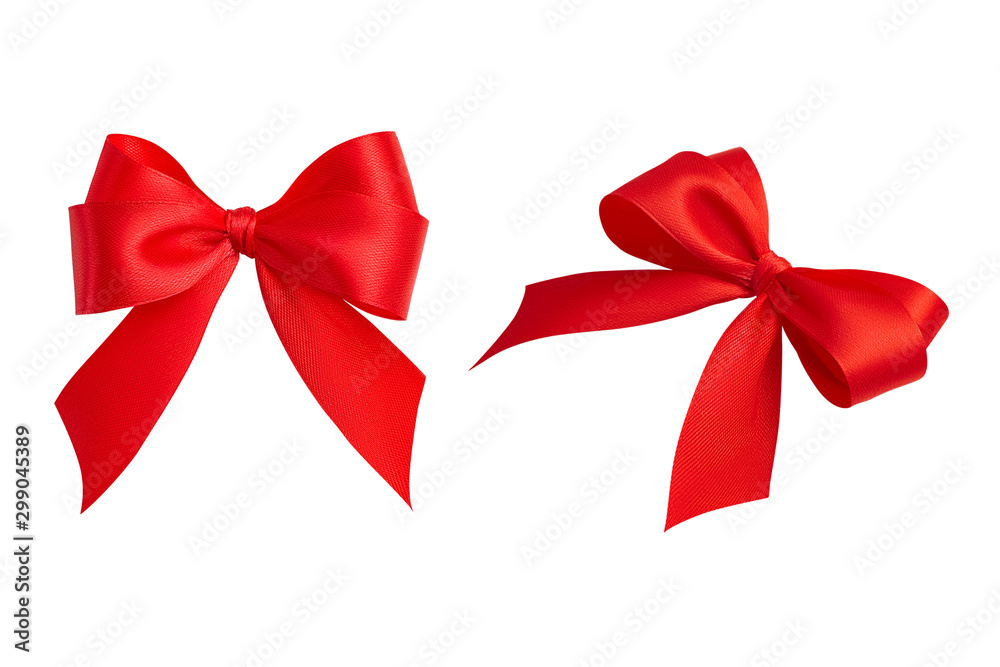 Set of two beautiful ornate perfect holiday handmade gift bows made of  bright red silk ribbon taken from different angles isolated on a white  background. Closeup, clipping path. Stock Photo