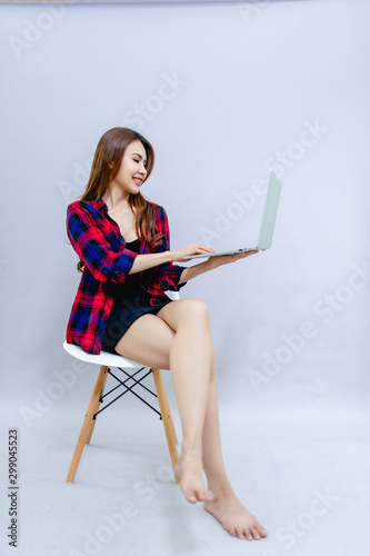Women and laptops Sit happily at work The concept of running a smooth business.