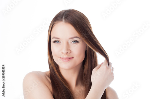 Gorgeous hair. portrait of a beautiful girl with long silky hair. Attractive young woman