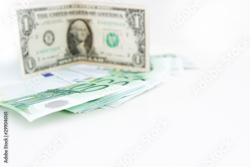American dollar closeup of blue euro money banknotes. Money savings concept. Euro cash on white background.
