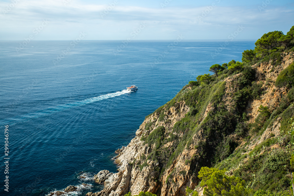 white boat sails Mediterranean sea