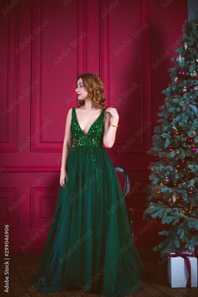 Christmas or New Year Holidays, magical atmosphere and pretty woman in luxury dress. Inspiration and winter idea