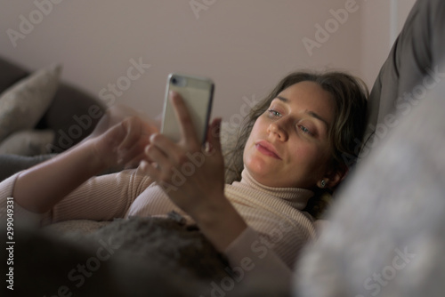 Woman watching mobile phone