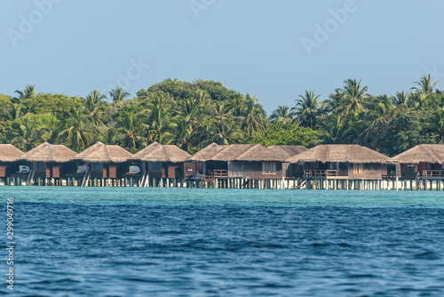 Tropical island with Water-Bungalows on the Maldives © Val Traveller