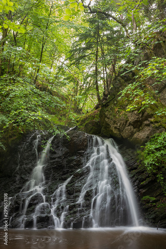 Fototapeta Naklejka Na Ścianę i Meble -  The waterfalls at  Fairy Glen, a hidden jewel found after a 30-minute hike through the woodlands near the town of Rosemarkie, Scotland on the Black Isle Peninsula.