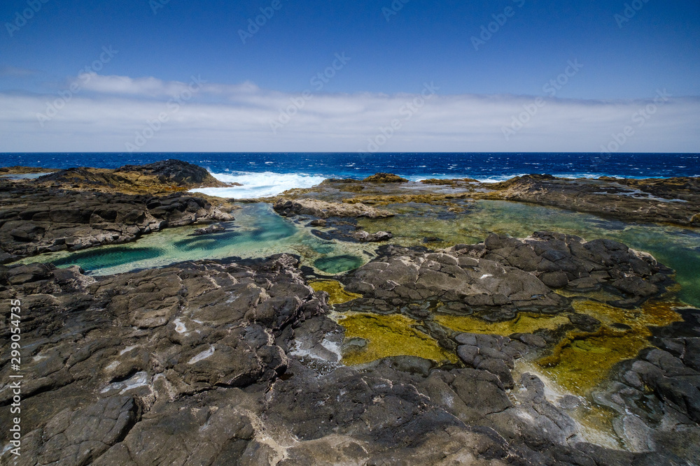Los Charcones area with beautiful green and blue pools of sea water