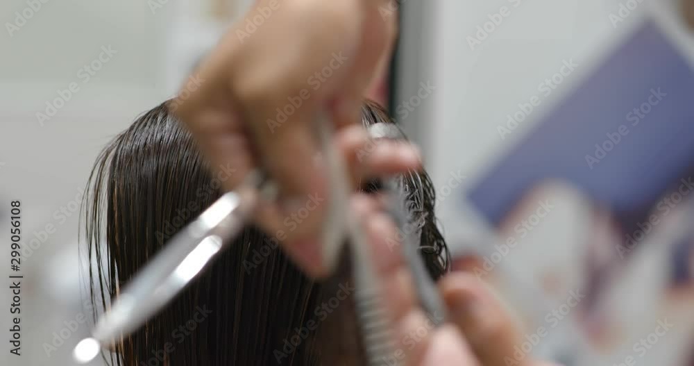 Woman with hair cut in beauty salon