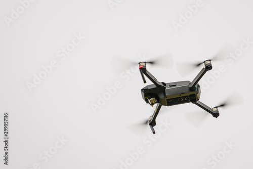 Drone flying over sky background