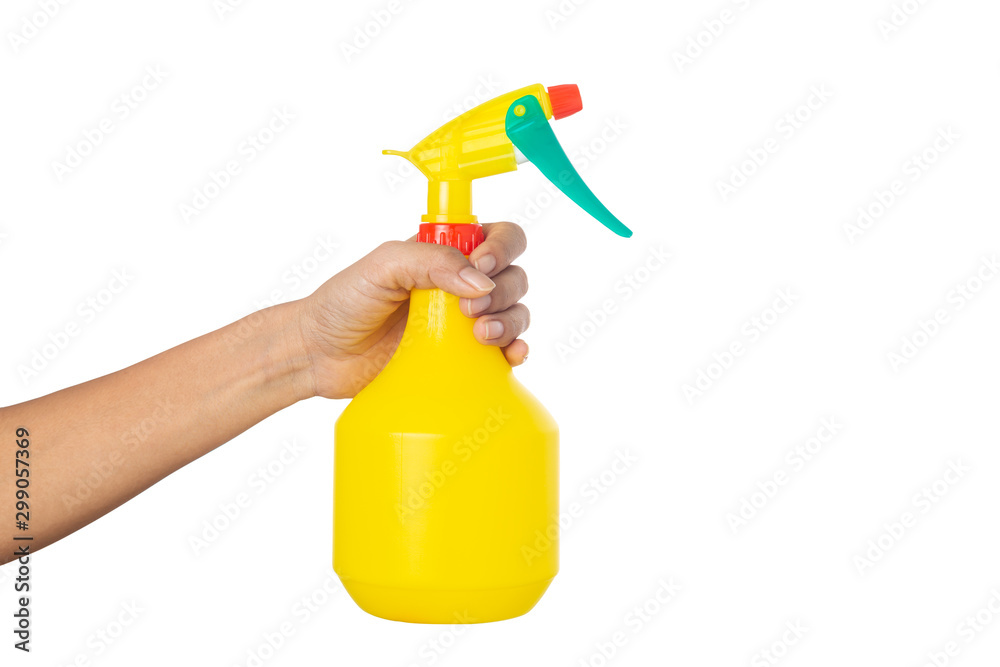 Woman hand holding a bottle sprayer water isolated on a white background Woman hand holding a bottle sprayer water isolated on a white background