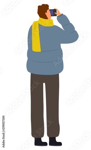 Man wearing warm clothes holding camera in hands vector. Isolated character taking photograph, professional with special device for photography. Hobby of male in jacket and scarf, leisure of person