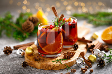 Christmas mulled wine. Traditional Xmas festive drink with decorations and fir tree