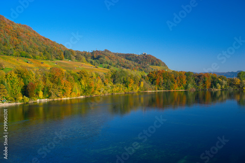 The river Rhine, only a few hundred meters young, after leaving Lake Constance. Autumn. Near the Swiss town Stein am Rhein. View from the car bridge to the west, the road leads to the Rhine Falls.