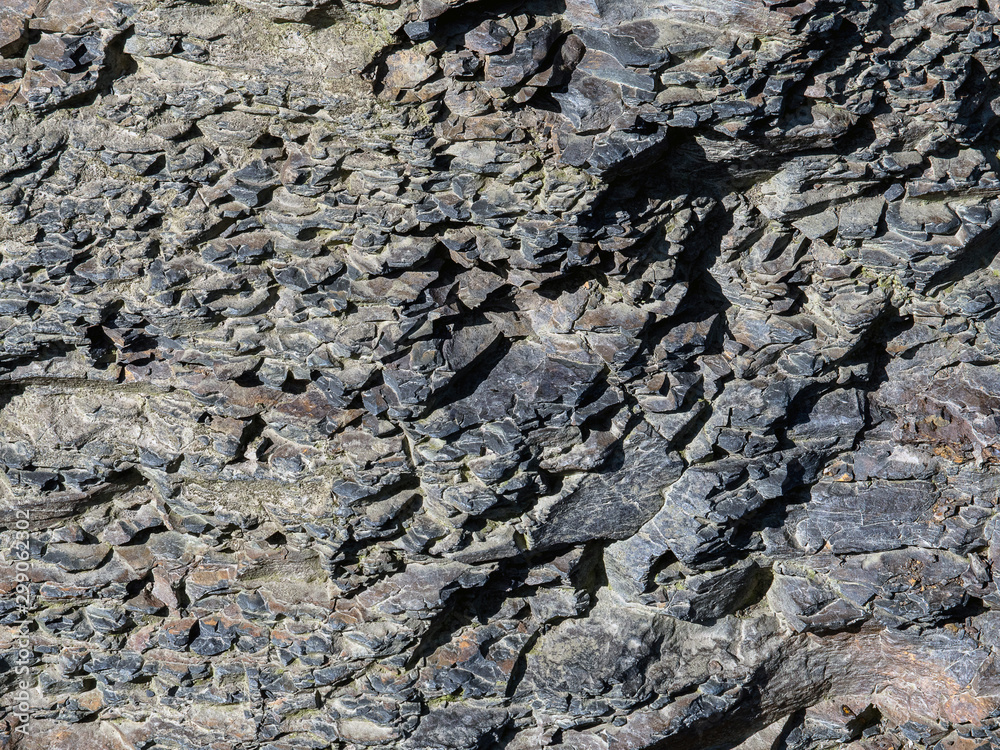 Simple rough stone texture close up, abstract background. Simple rough stone texture close up, abstract background.