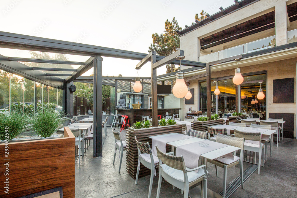 Restaurant with large open garden interior Restaurant with large open garden interior