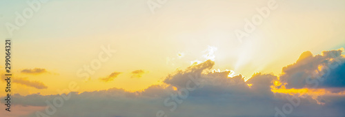 Blue sky clouds background. Beautiful landscape with sunset