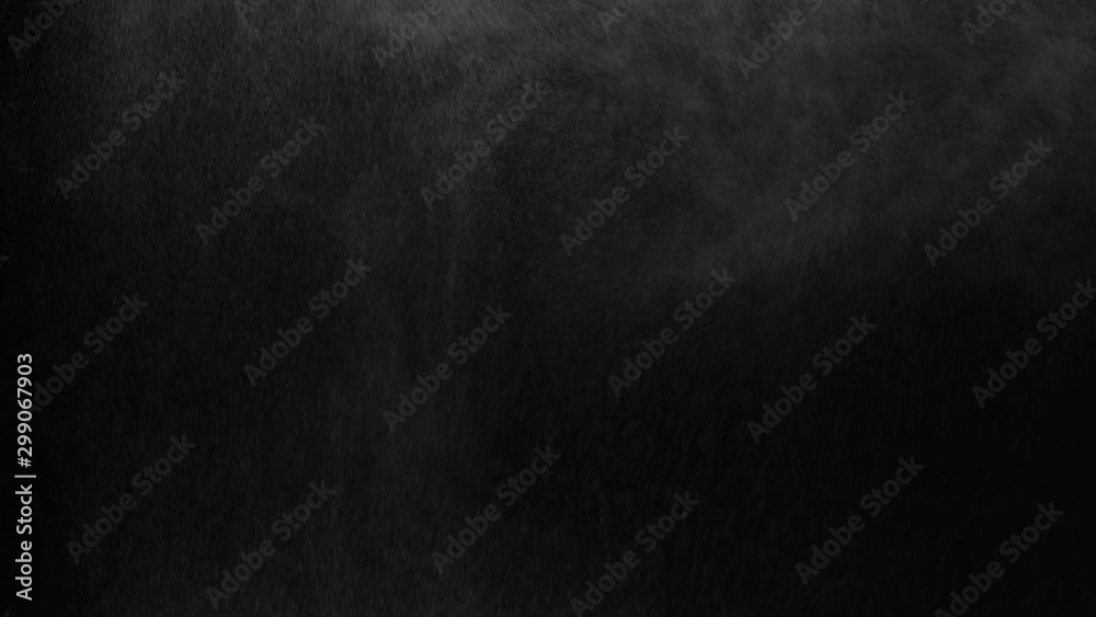 white vapour or spray water on a black background ,slow motion movement