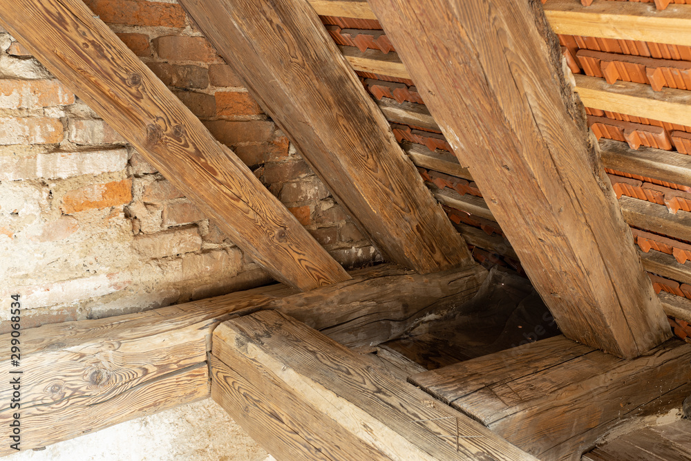 corner details of very old roof framework - see graved signs in the wood corner details of very old roof framework - see graved signs in the wood