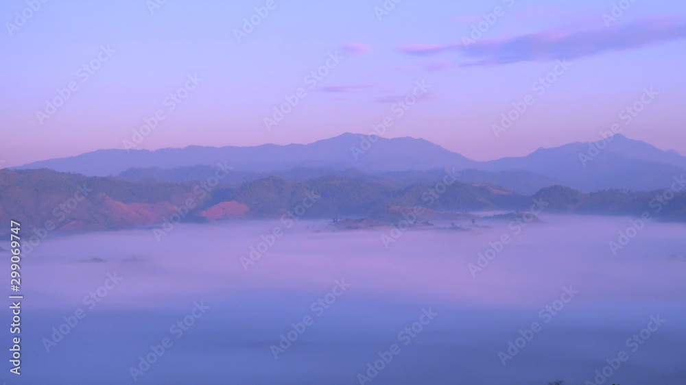 The fog in the morning before sunrise over mountains