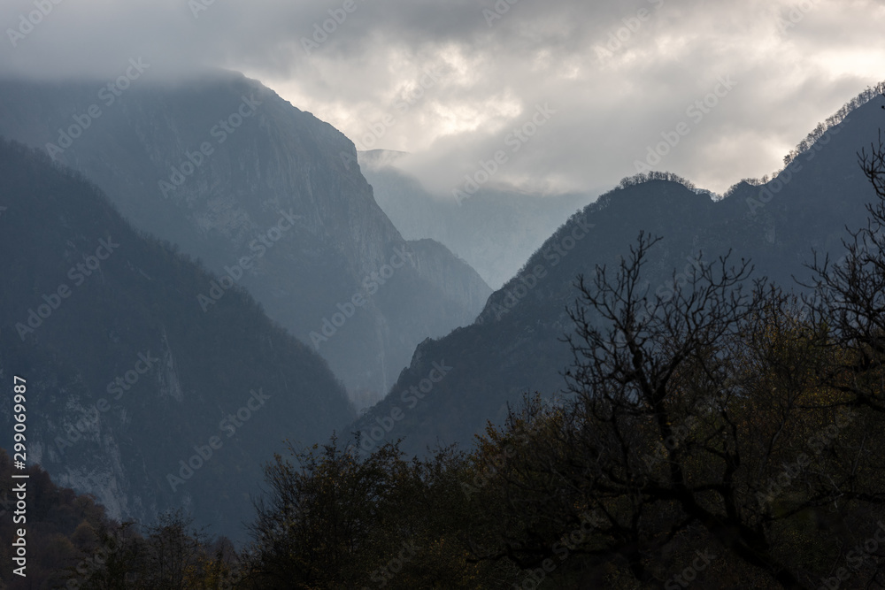 Mountain gorge in cloudy foggy weather
