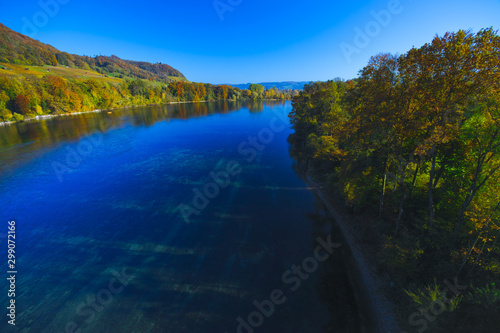The river Rhine, only a few hundred meters young, after leaving Lake Constance. Autumn. Near the Swiss town Stein am Rhein. View from the car bridge to the west, the road leads to the Rhine Falls. © Kai