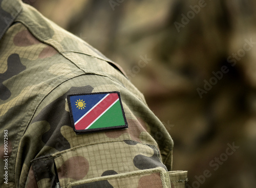 Flag of Namibia on military uniform. Army, troops, soldiers. Collage.