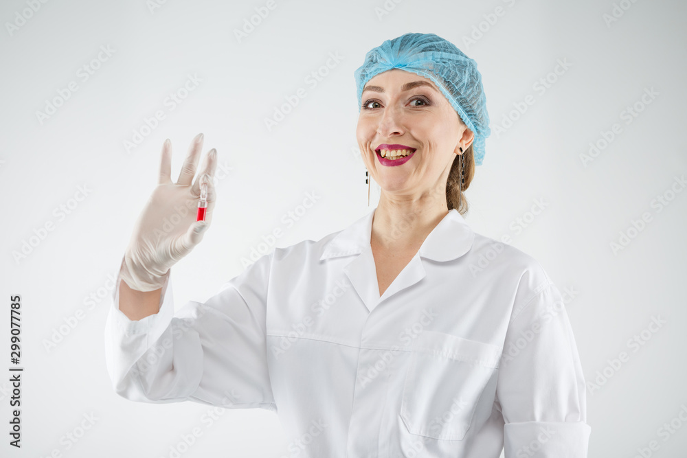 Silhouette of a doctor anesthetist with a syringe on a gray background. Silhouette of a doctor anesthetist with a syringe on a gray background.