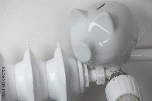 heater money pig on white wall