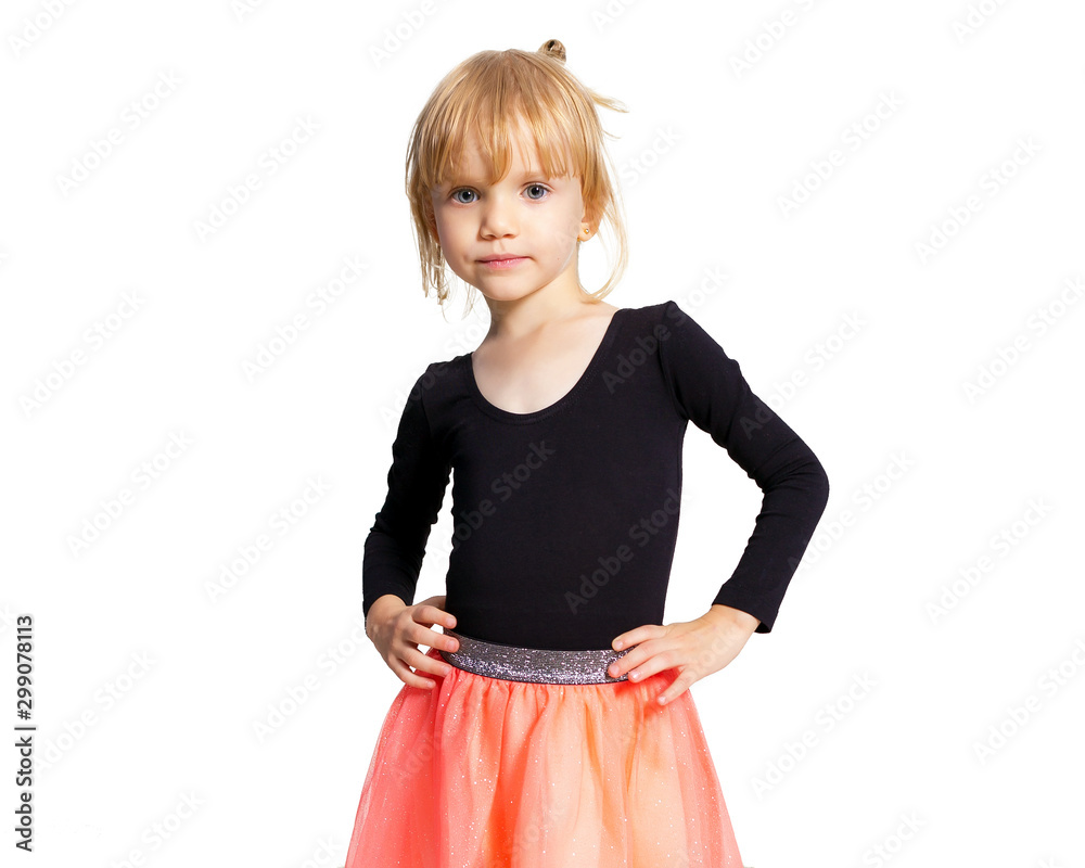 Little blonde ballerina girl posing in dance club with wooden floor and white wall. Young ballet dancer in pink tutu, having fun and smiling. Background, copy space. Little blonde ballerina girl posing in dance club with wooden floor and white wall. Young ballet dancer in pink tutu, having fun and smiling. Background, copy space.