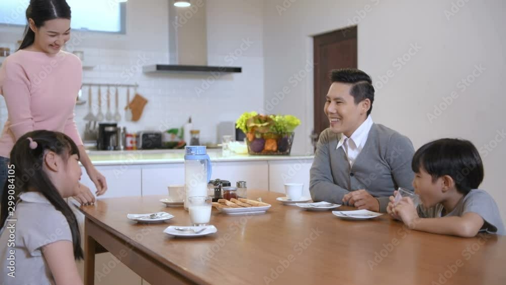 Holiday concept. The family is having breakfast together. 4k Resolution. Holiday concept. The family is having breakfast together. 4k Resolution.