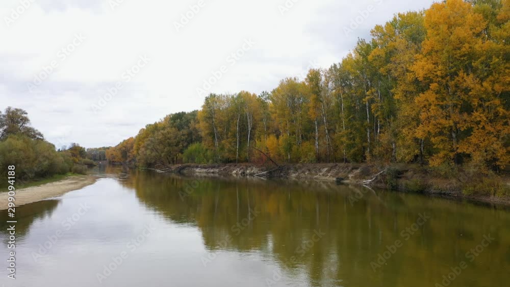 Aerial view of the Beautiful River Landscape at autumn. Moving camera forward subject. Cloudy day. Aerial view of the Beautiful River Landscape at autumn. Moving camera forward subject. Cloudy day.