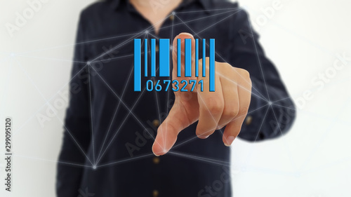 Businesswoman  using barcode on digital network hologram