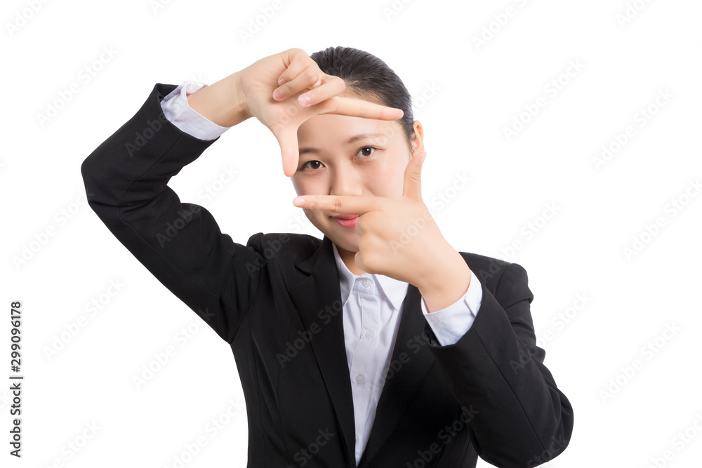 Young beautiful brunette businesswoman smiling looking at camera pointing finger in side over white background. Young beautiful brunette businesswoman smiling looking at camera pointing finger in side over white background.