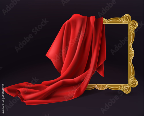 Red silk cloth cover wooden painting frame isolated on black background. Fabric drapery curtain and empty picture or photo border mockup for gallery presentation. Realistic 3d vector illustration