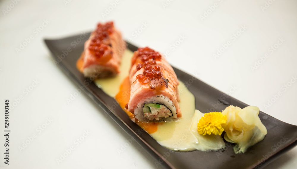salmon roll with miso sauce and decorate with Caviar salmon roll with miso sauce and decorate with Caviar