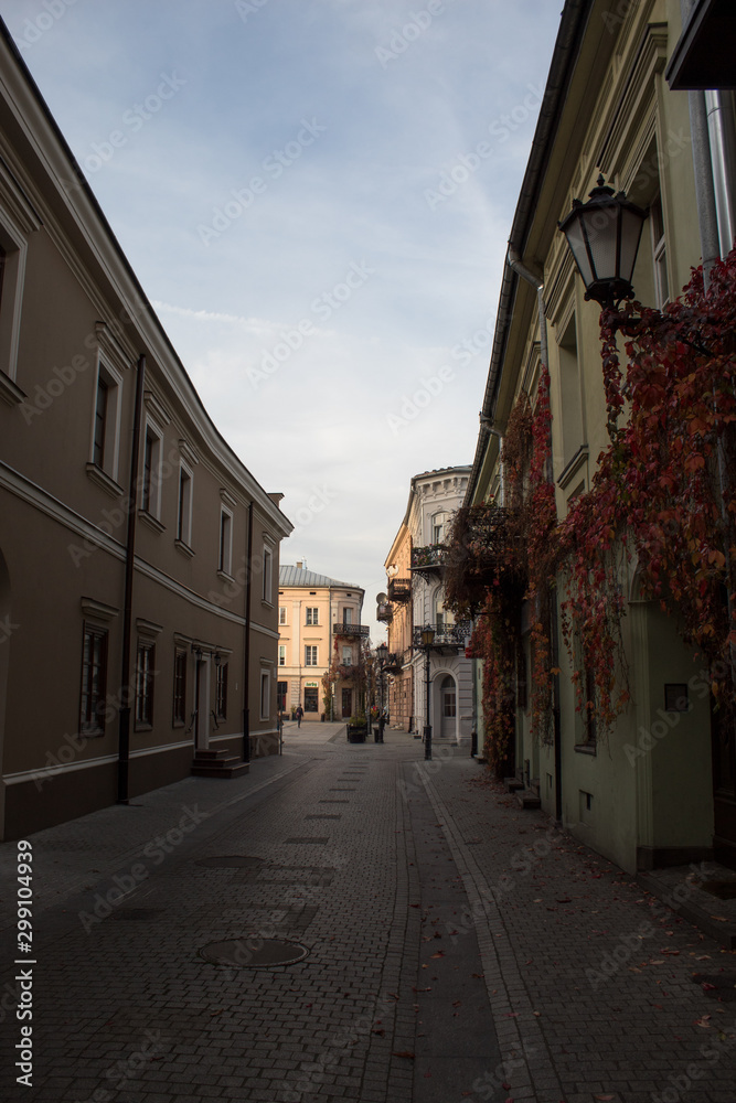 Cityscape of the historical streets of the Old Town in the center of Poland Piotrkow-trybunalski, which is 800 years old: architecture, fortress, churches.