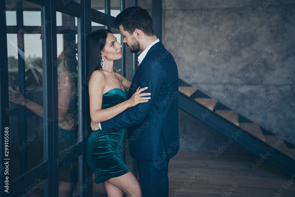 Profile photo of tenderness stylish trendy couple guy lady leaning glass  wall door tempting prelude intimate erotic wish wear fancy formalwear blue  suit short shiny dress loft indoors Photos | Adobe Stock