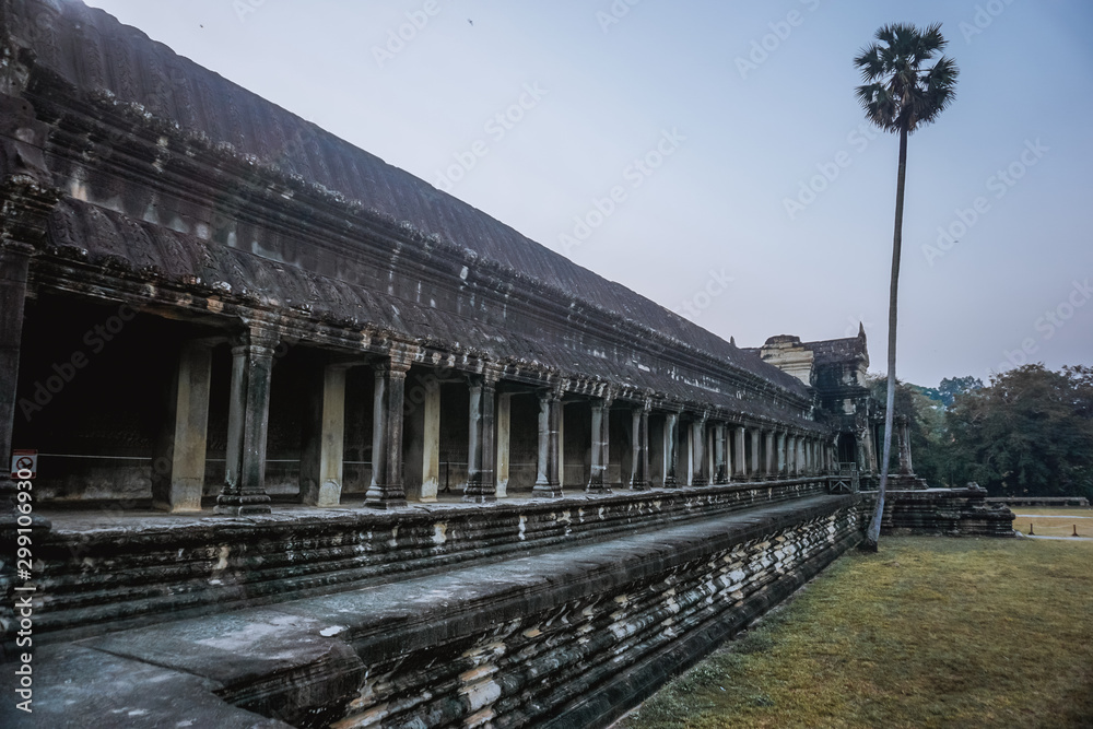 Ancient architecture and ruins of Angkor Wat early in the morning. Ancient architecture and ruins of Angkor Wat early in the morning.