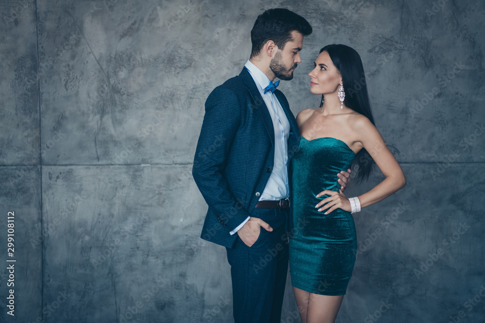 Photo of two vogue people standing close looking tenderness eyes naughty dreams homey after party wear luxury shiny formalwear suit dress indoors