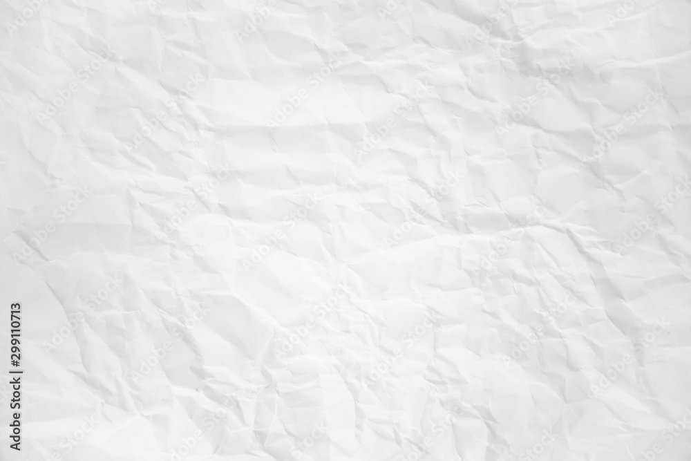 white and gray wide crumpled paper texture background. crush paper so that it becomes creased and wrinkled. white and gray wide crumpled paper texture background. crush paper so that it becomes creased and wrinkled.