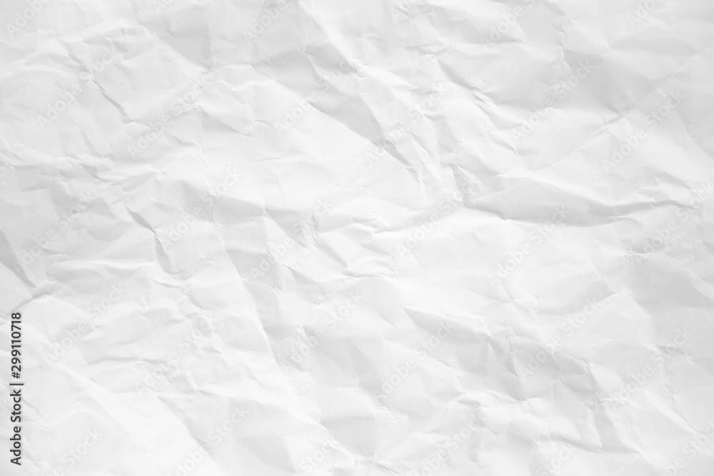 white and gray wide crumpled paper texture background. crush paper so that it becomes creased and wrinkled. white and gray wide crumpled paper texture background. crush paper so that it becomes creased and wrinkled.