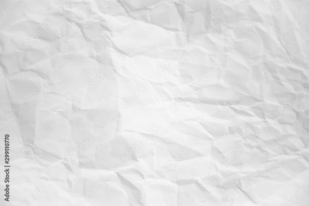 white and gray wide crumpled paper texture background. crush paper so that it becomes creased and wrinkled. white and gray wide crumpled paper texture background. crush paper so that it becomes creased and wrinkled.
