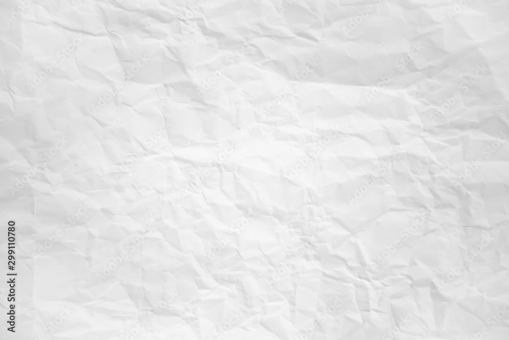 white and gray wide crumpled paper texture background. crush paper so that it becomes creased and wrinkled. white and gray wide crumpled paper texture background. crush paper so that it becomes creased and wrinkled.