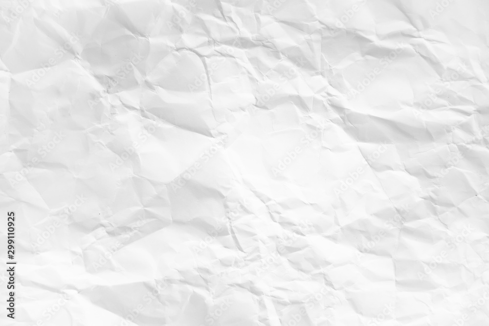 white and gray wide crumpled paper texture background. crush paper so that it becomes creased and wrinkled.